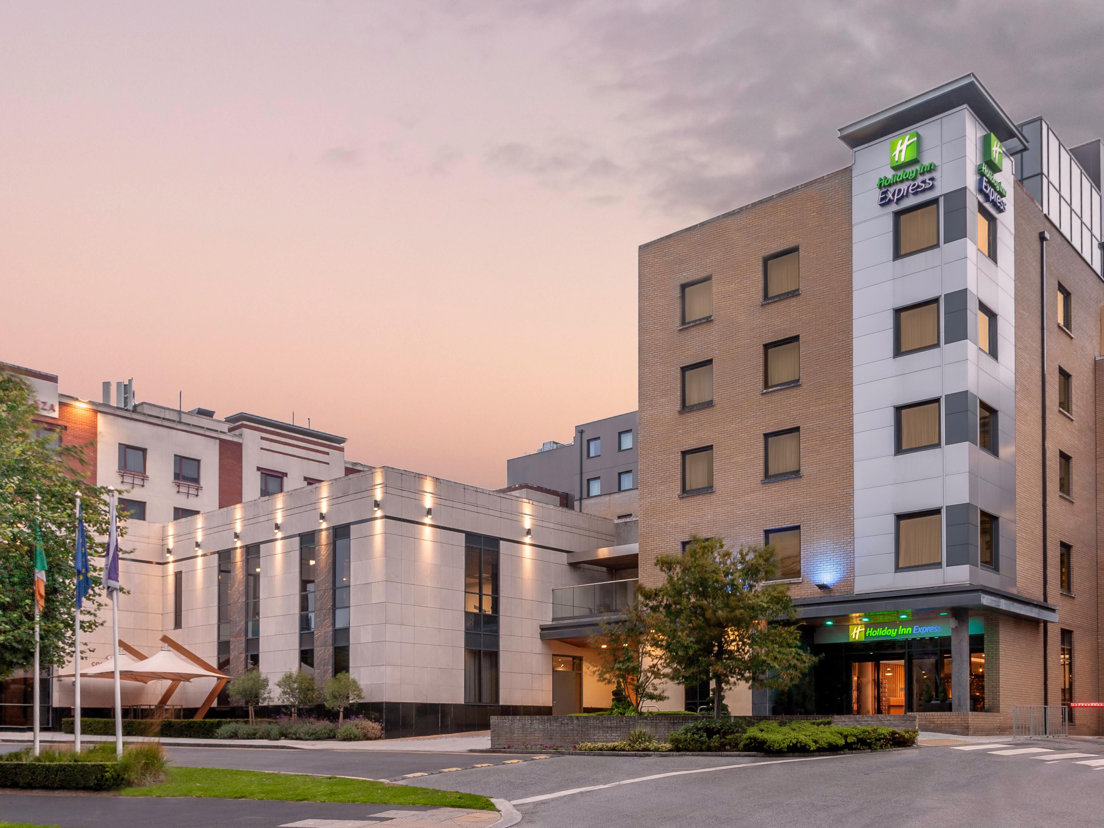 Airport hotel exterior at dusk