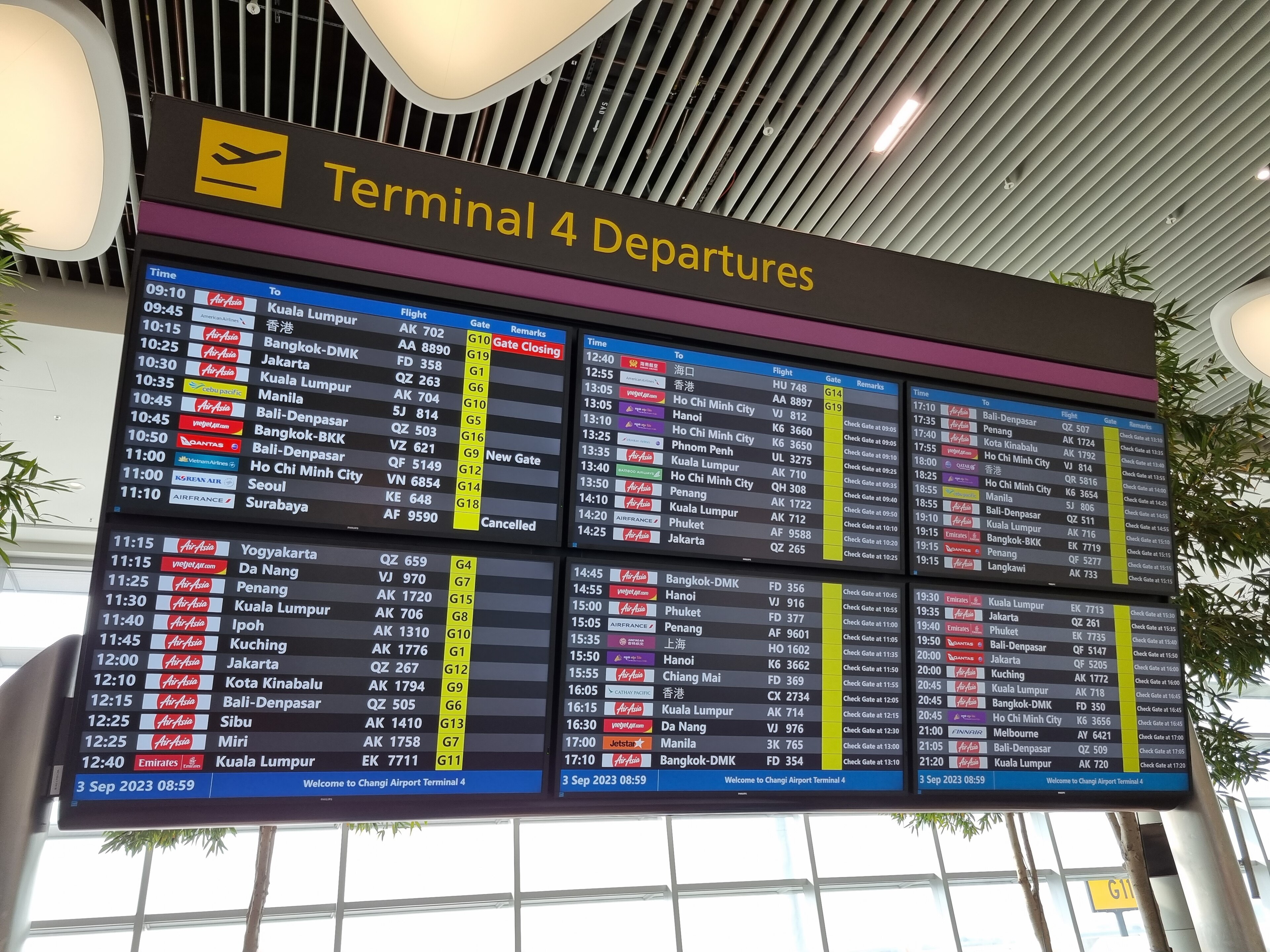 Airline departure board at dawn